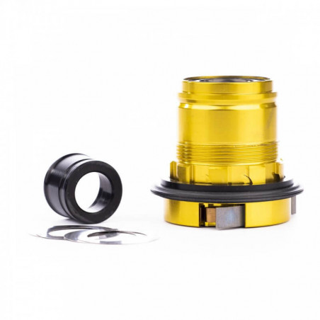 Tune Umrüstkit, Freilauf Shimano HG10/11 3-Klinken, Endurance Freilauf, Endurance Lager, für X-12 (142x12), gold